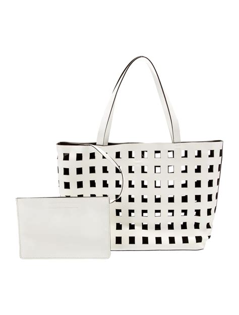 prada white laser cut|Prada Spazzolato Laser Cut Tote .